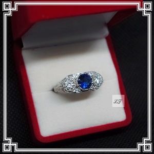 Genuine Sapphire and White Topaz Ring